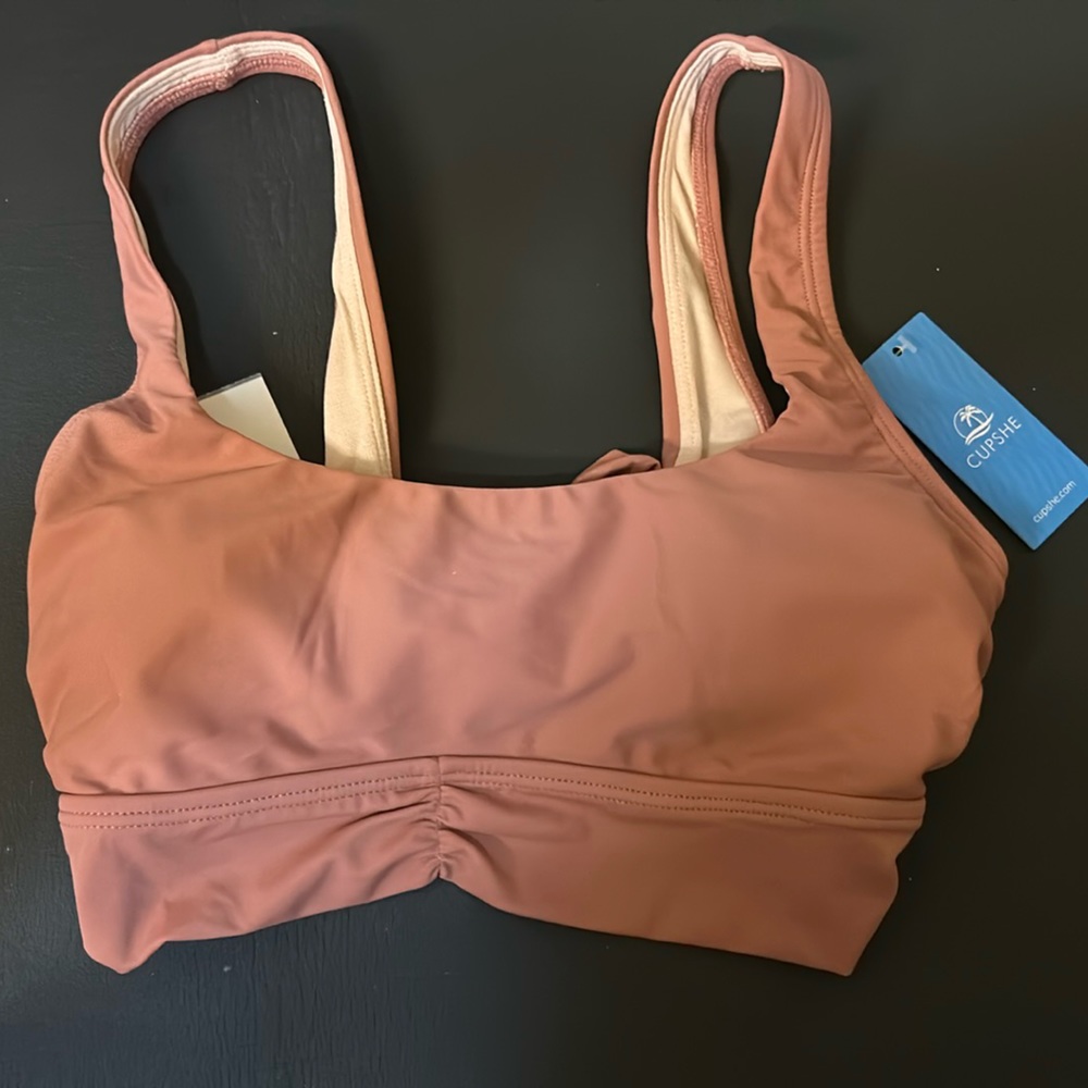 BNWT Tan Cupshs swim bikini top with cups thick straps and a tie up back. Size S